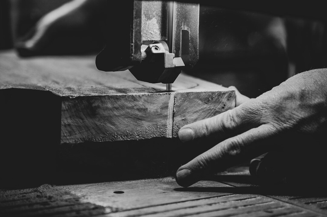 Local craftsman working with wood in a workshop