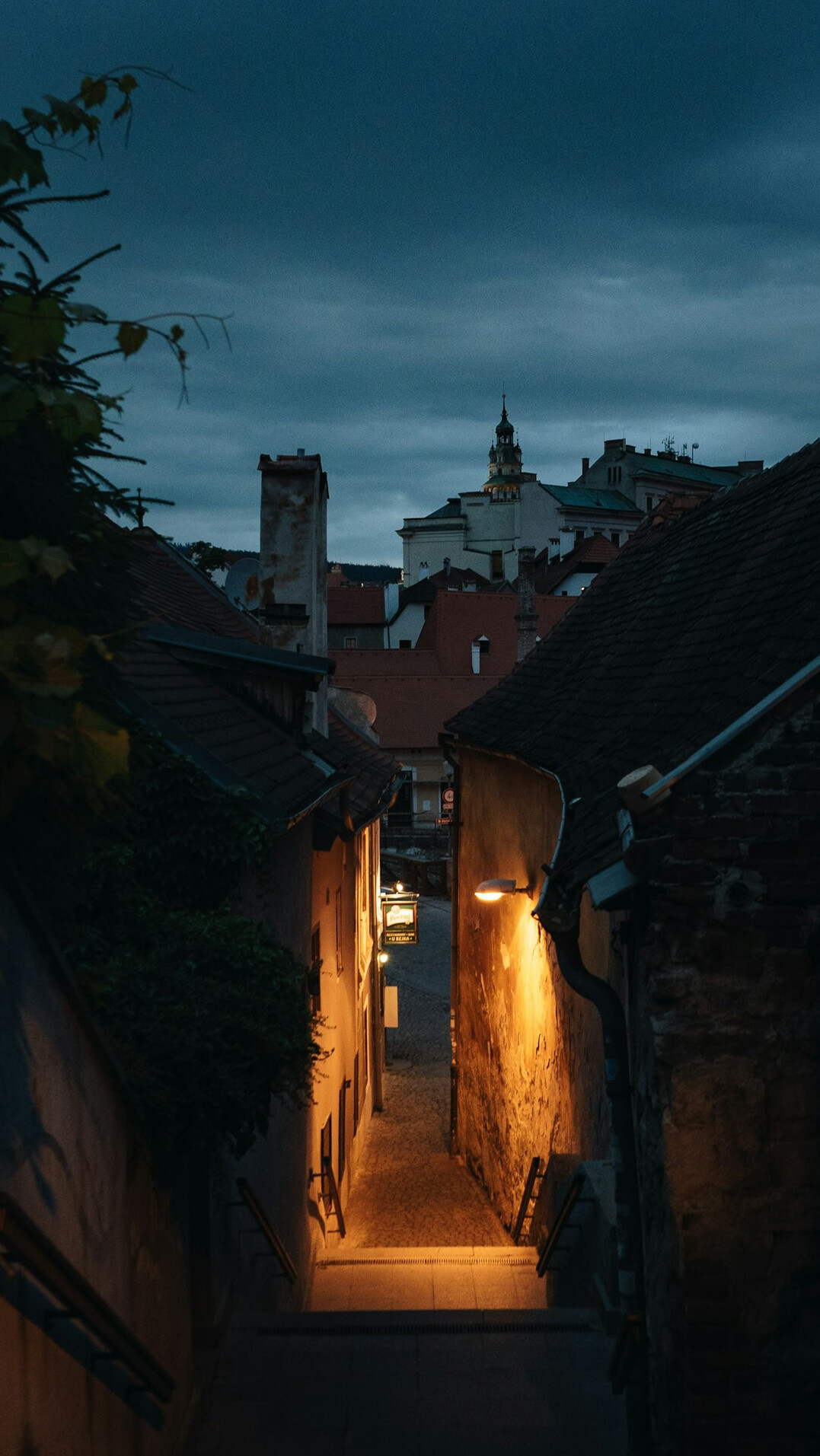 Narrow street in an old Polish town at dusk